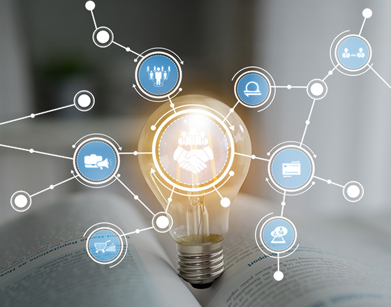 light bulb surrounded by interconnected icons representing business concepts collaboration growth and networking