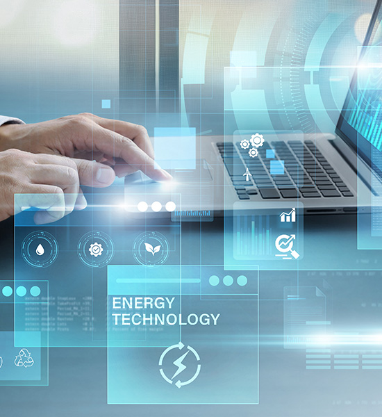 hands interacting with a laptop displaying digital icons and data analytics about energy technology and advancements in 10 crucial areas