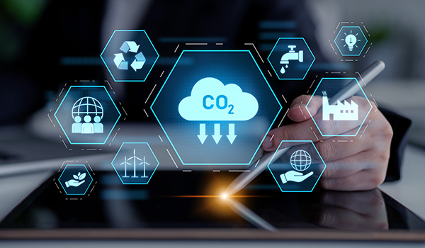hand using a tablet to display icons related to carbon emissions recycling and sustainability with a focus on 11 eco-friendly solutions